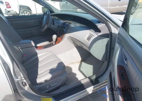 2004 Toyota Avalon Xl/Xls z USA, uszkodzony, nr VIN 4T1BF28B74U348526